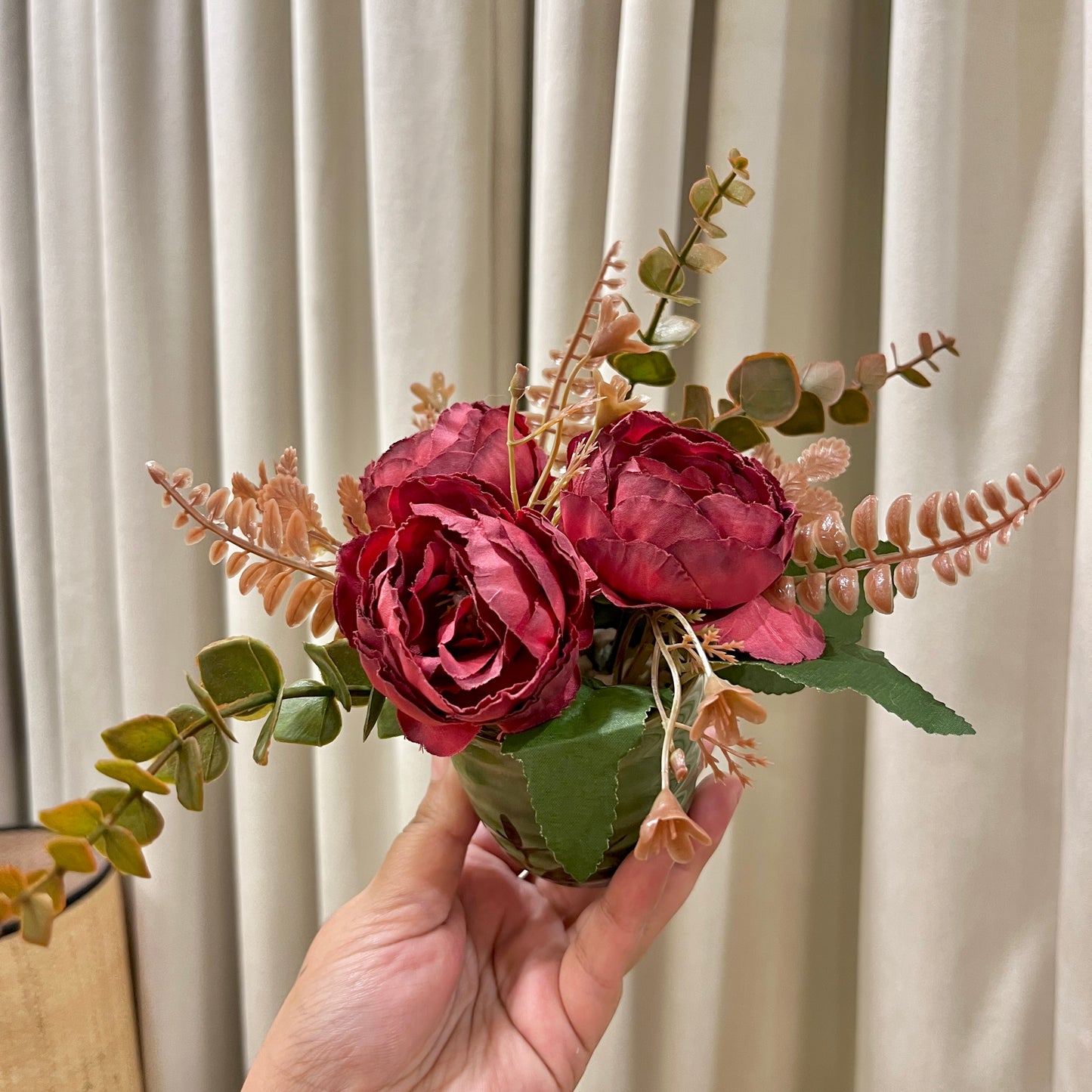 Ancient style green pot with Red Roses