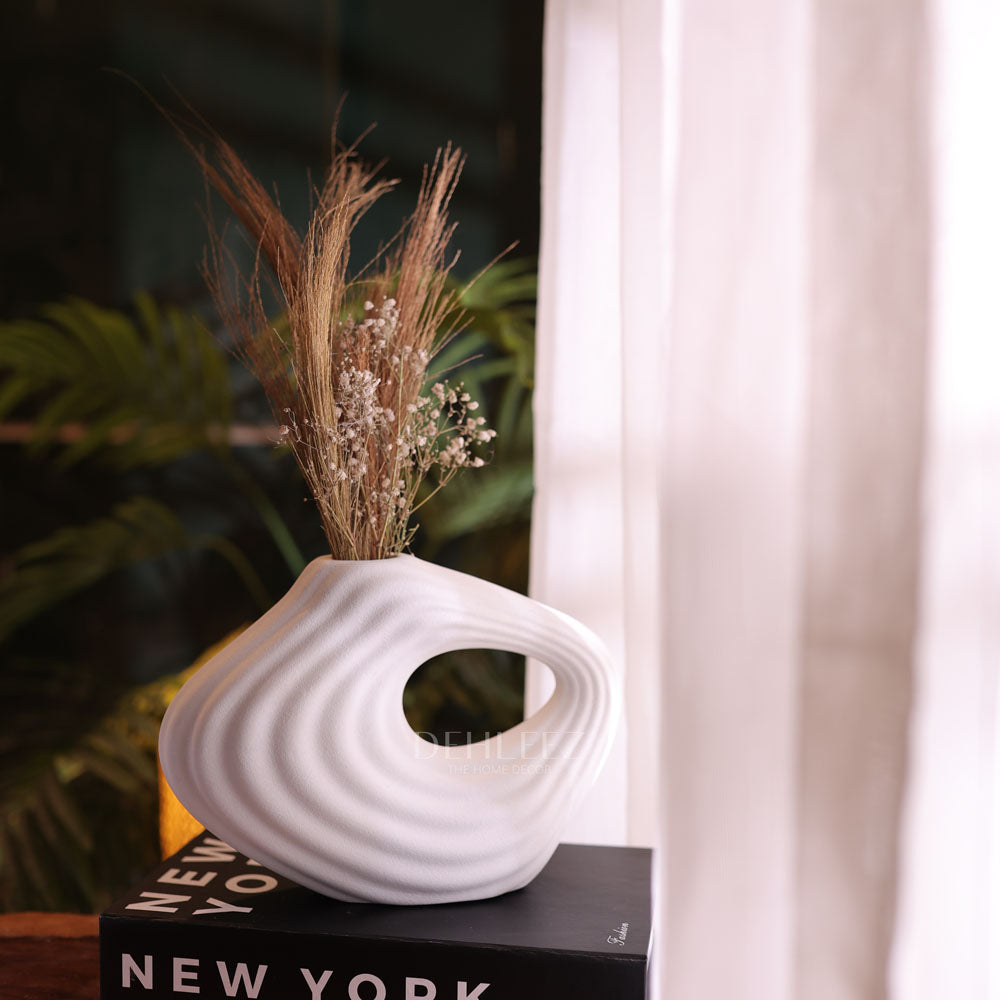 De hole Vase