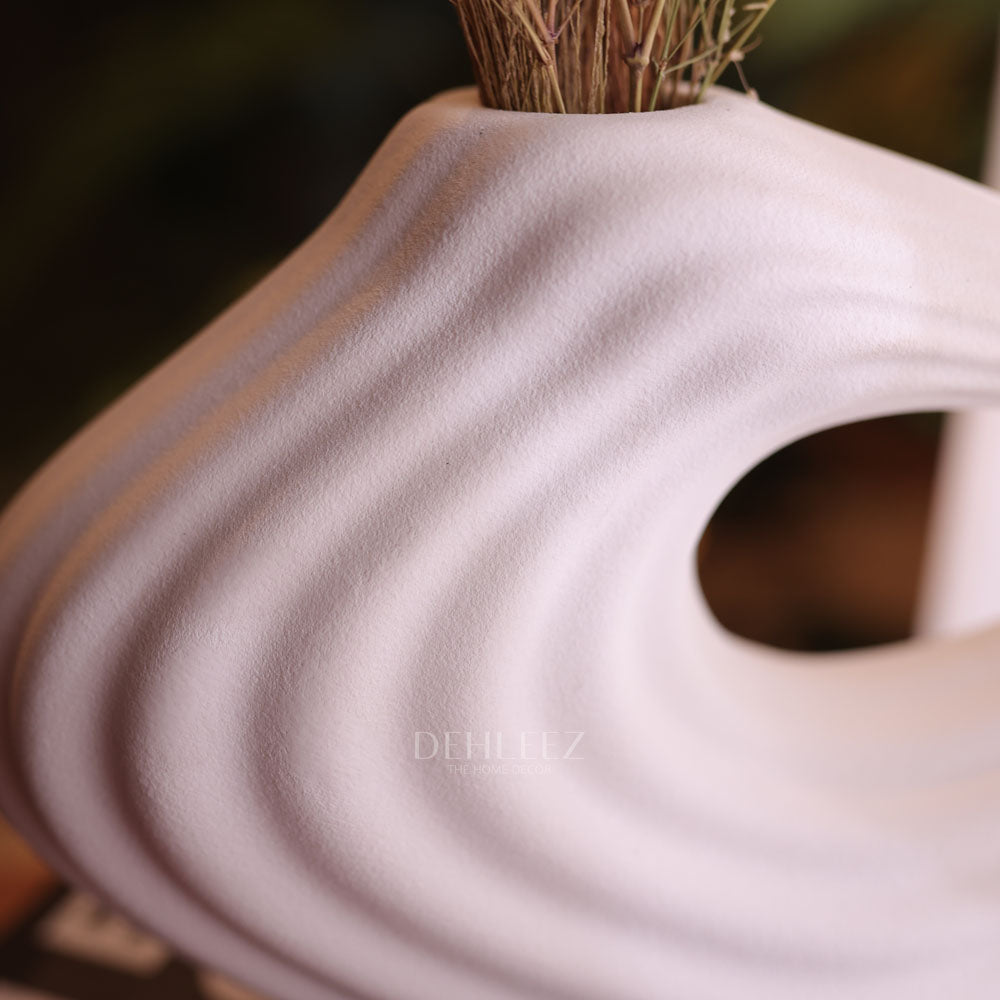De hole Vase