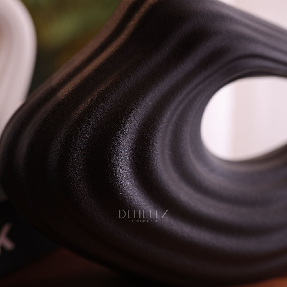 De hole Vase