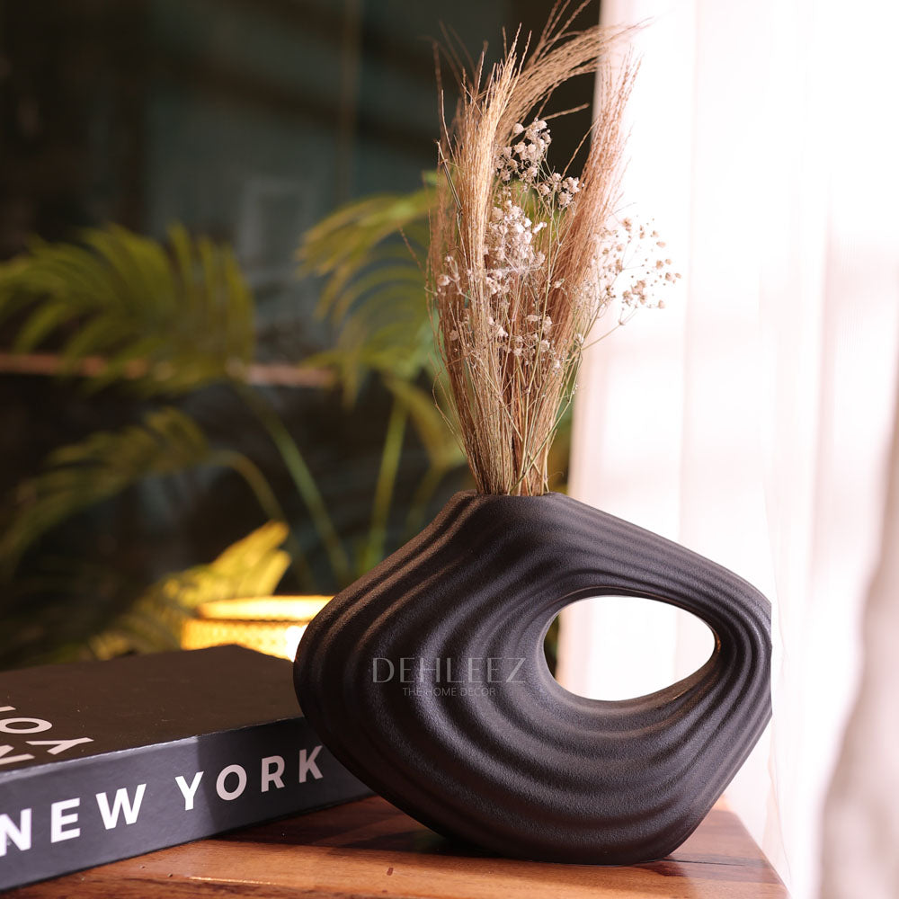 De hole Vase