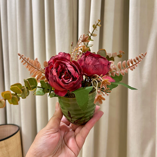 Ancient style green pot with Red Roses